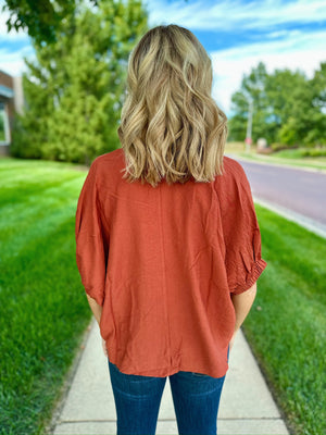 Cheetah Trim Dolman Sleeve Top in Paprika