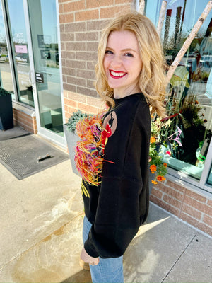 Queen of Sparkles Turkey Feathers Sweater in Black