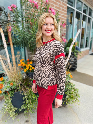 Keyhole Back Animal Print Sweater with Red Trim