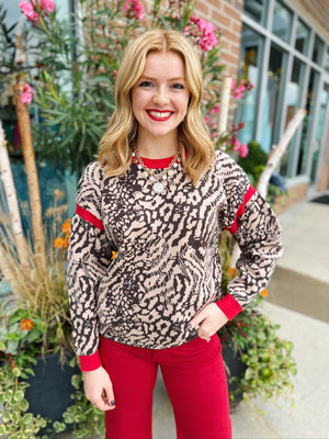 Keyhole Back Animal Print Sweater with Red Trim